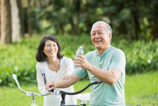 Older couple cycling fitness